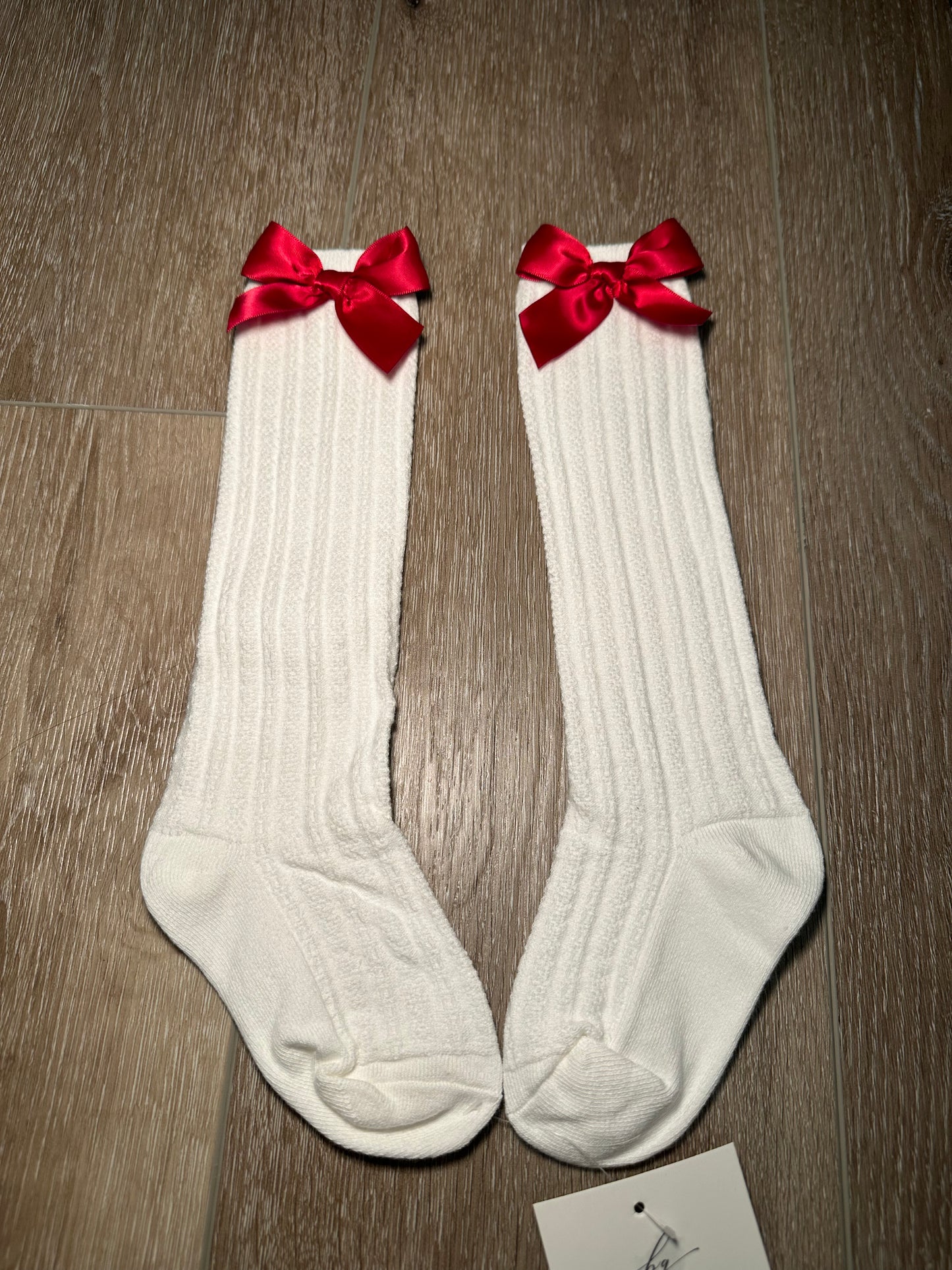 SOCKS WITH RED BOW